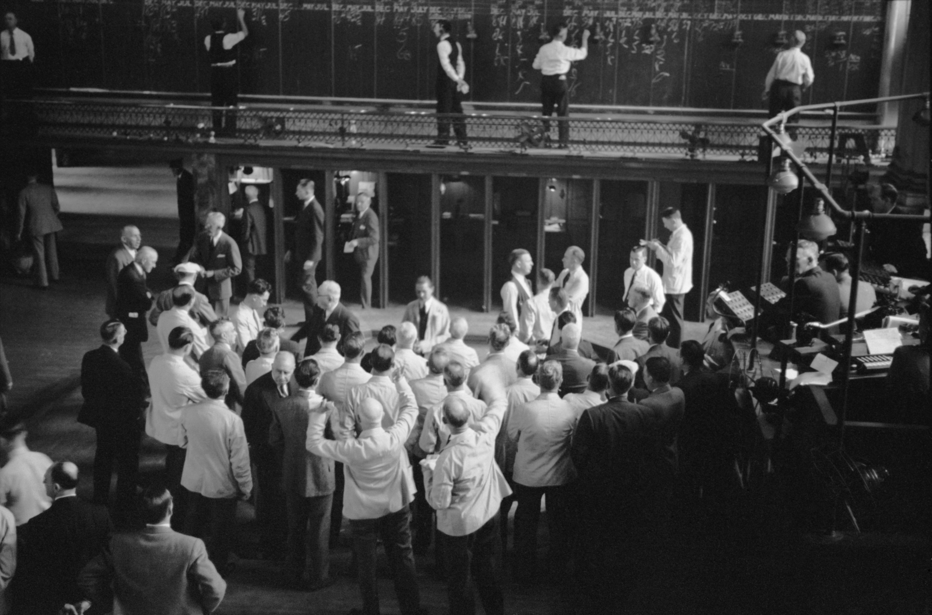 Historic stock exchange trading floor with traders and market activity