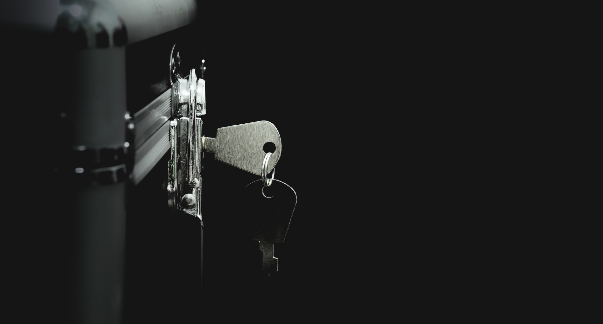 Key inserted into a lock representing access and transparency