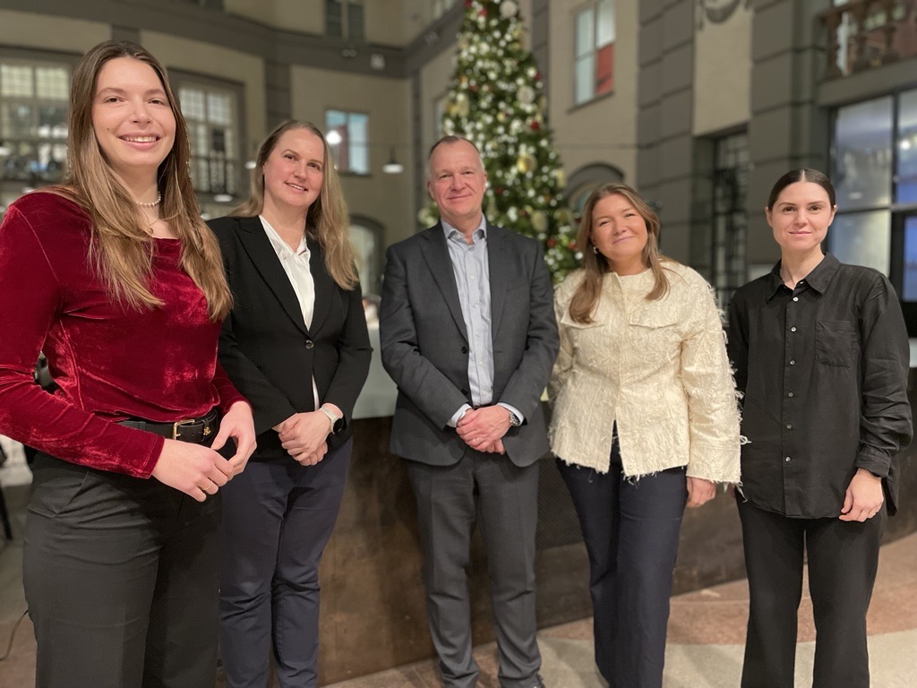 Group photo of the five speakers at the Women in Finance Glögg Mingle