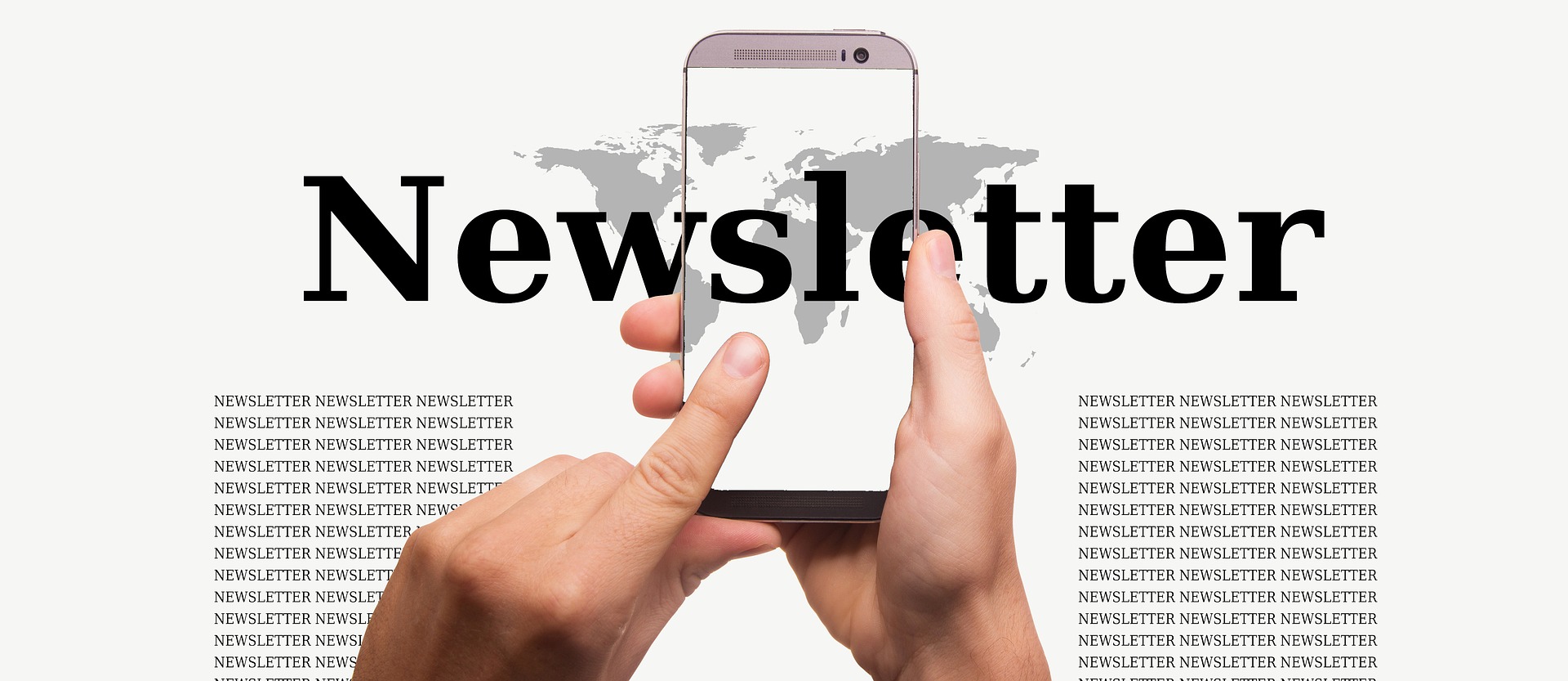 Smartphone displaying a newsletter in front of a world map graphic