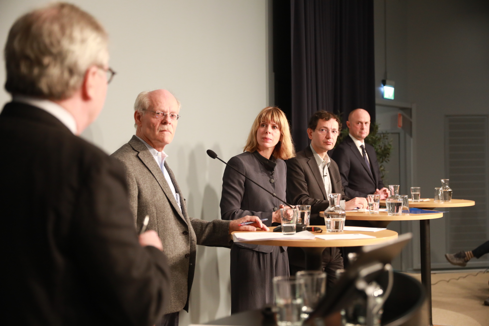 Four panelists speaking at the SNS/SHoF Finance Panel 2025